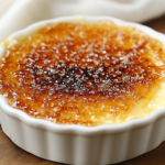 A perfectly caramelized crème brûlée with a crisp sugar topping.